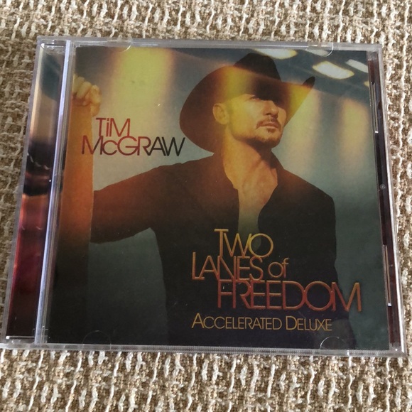 2. country CDs Tim McGraw and Brett Young - Picture 9 of 16